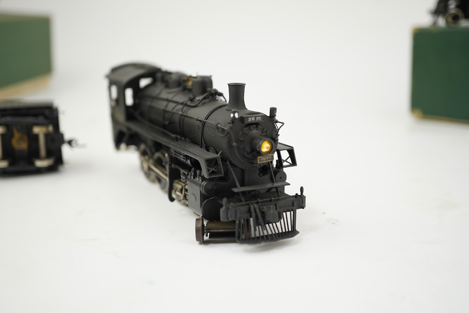 Two boxed HO gauge Canadian Pacific locomotives; a Toby of Japan model of 2412, 4-6-2 locomotive with bogie tender, together with a United Scale Models 3710, 2-8-0 locomotive with bogie tender, both powered for two rail